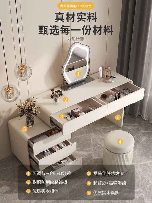 帶鎖梳妝檯現代簡約臥室小戶型輕奢實木化妝桌高級感收納鬥櫃一體